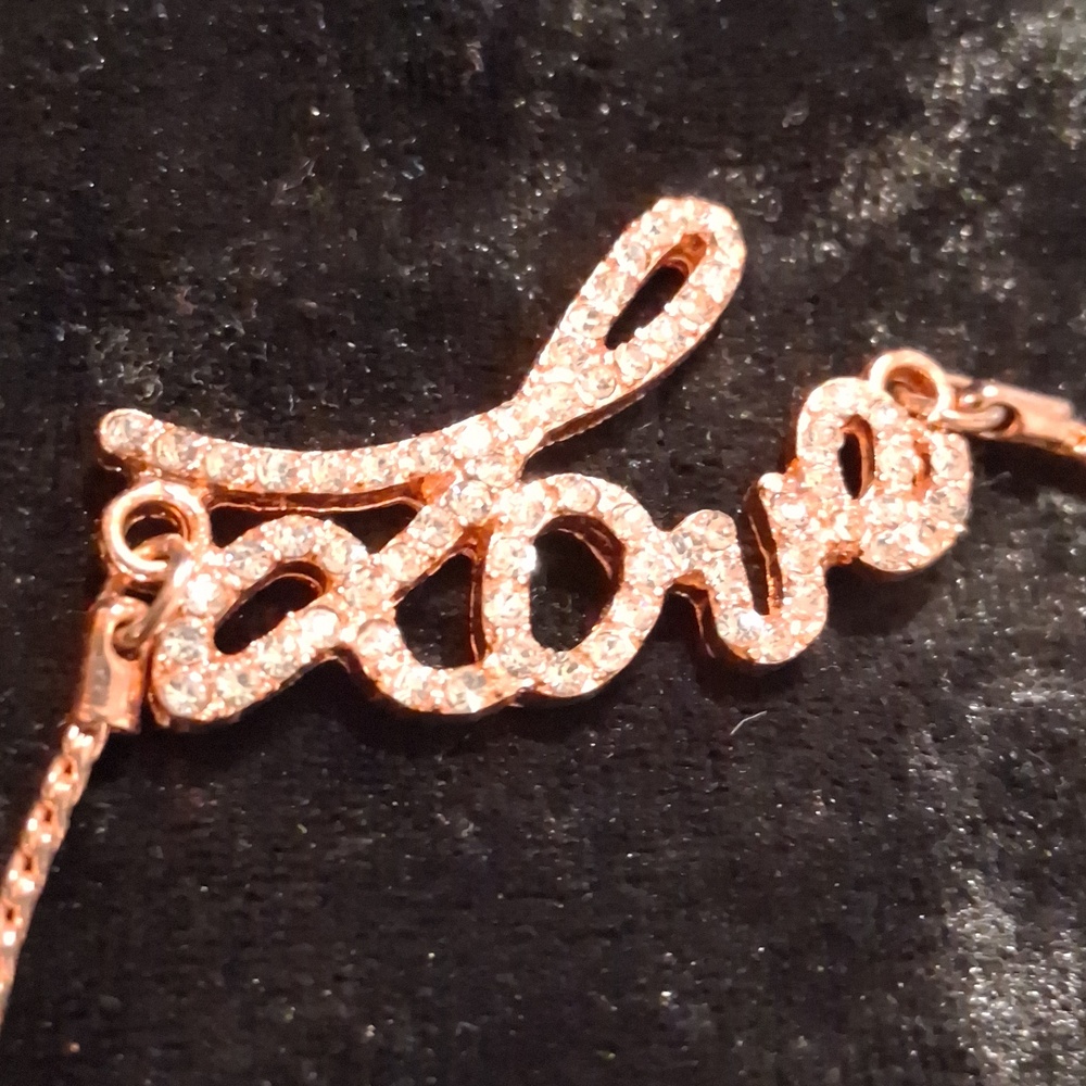 Elegant Rose Gold Love Slide Bracelet.